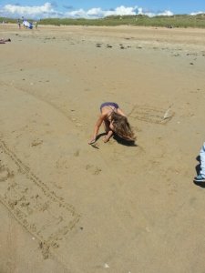 ecrire dans le sable